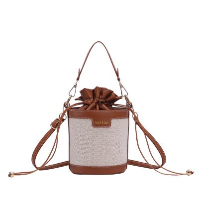 China Waterproof Cross Body Bucket Women Young Girl Bags Mini Versatile Casual Shoulder Girls Bucket Bags for sale