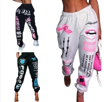 China Anti-Wrinkle Fashion Graphic Joggers High Waist Drawstring Long Pants With Graffiti Streetwear Plus Size Womens Trousers Pants for sale