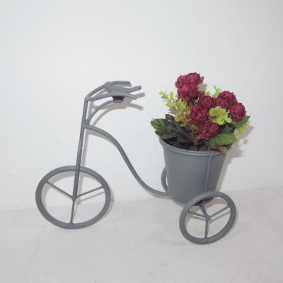 China Home Decor Cartoon Black Metal Garden Bike Plant Stands Flower Pot Rack for sale