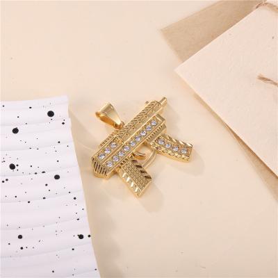 China Trendy Hiphop Hiphop Fashion Jewelry Iced Out Stainless Steel Letter 18K Gold Plated Creative Gun Pendant for sale