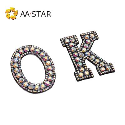 China Viable crystal fix rhinestone custom bling hot iron on designer glue letter jacket patch applique for apparel for sale