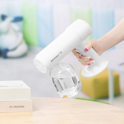 China Pesticide Liquid Mist Sprayer Portable Nano Sprayer Wholesales Machine Blue Light Disinfection Mist Sterilizer Air Gun Steam Atomizer Nano Spray Gun for sale