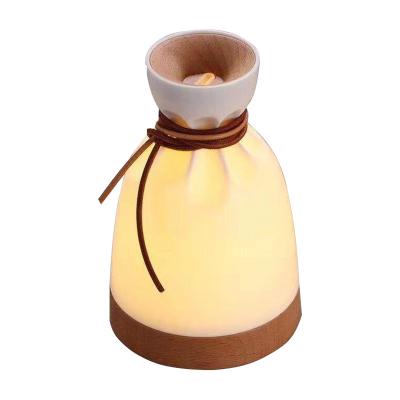 China Portable Mini Size Ultrasonic Essential Oil Diffusor Air Humidifier 0.5-2L Wood Grain Aroma Diffuser 0.5-2L Mini Humidifier LED Light for sale