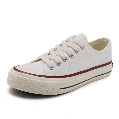 China Fashion Trend Classic Lace Up Low Cut White Canvas Woman Casual Shoes School Shoes For Men for sale