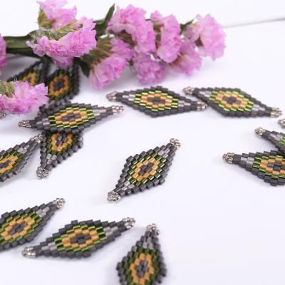 China Custom Wholesale Bulk Half Handmade Seed Bead Jewelry Making Seed Beads Diy Charms Accessories for sale