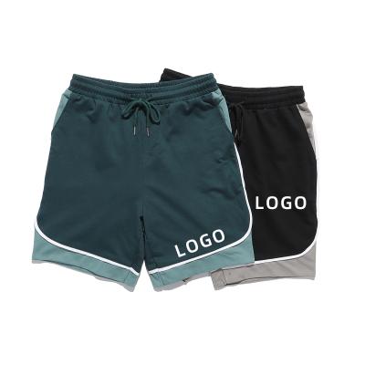 China Men's breathable shorts stitching casual loose men and women the same sports fitness five-point pants for sale