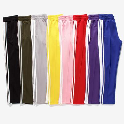 China Anti-wrinkle Men's Casual Fitness Pants Couples Stitching Split Pants Sports Running Trousers for sale