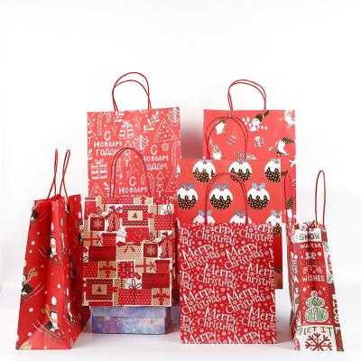 China Eco-friendly Christmas Bags For Gifts Reusable Wrapping Paper Christmas Candy Packaging Bags Christmas Decorations Paper Bags for sale