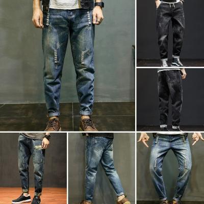 China Dots men's thin thin jeans summer viable new ripped small foot pants men stretch pants for sale