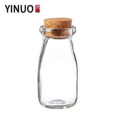 China Beverage 100ml 150ml Mini Food Safe Clear Glass Milk Bottle With Cork for sale