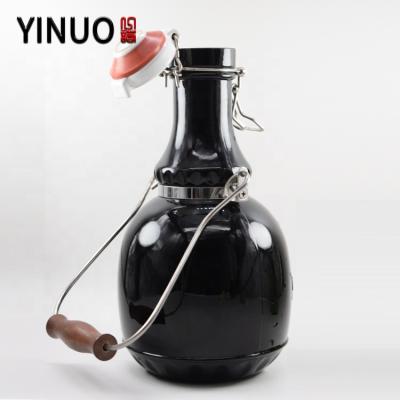 China Custom Beverage Beer Bottle Beer Container With Swing Top Cap And Lid for sale