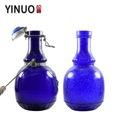 China Beverage Swing Top Beer Bottle Ceramic Beer Glass With Lock For Kombucha for sale