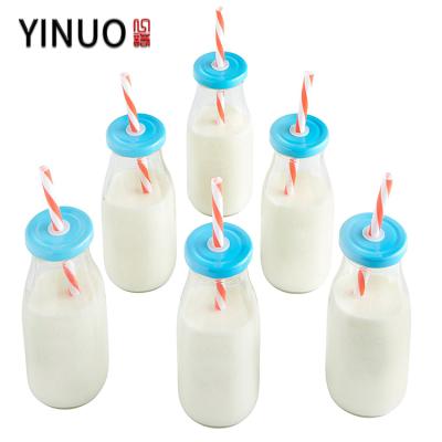 China Beverage 250ml 500ml 16oz Wide Mouth Juice Glass Juice Bottle With Lid for sale