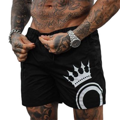 China 2021 New Anti-Wrinkle Muscle Fitness Basketball Sports Shorts Mens Beach Running Quick Dry Casual Pants for sale