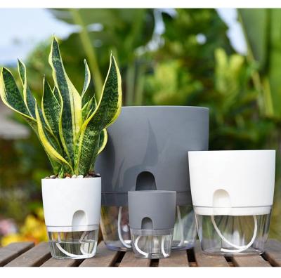 China Modern American Eco-friendly Small Planter Self Garden Watering Planter Customized Logo Plastic Style Modern Flower Pot for sale