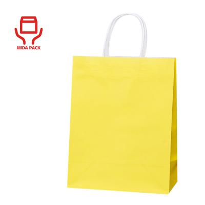 China Recycled Materials Flat Bottom Paper Bag Biodegradable Custom Kraft Paper Bag With Customizable Handles for sale