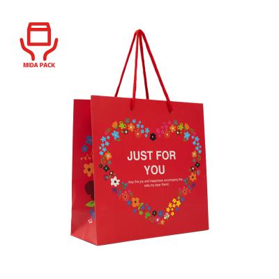 China Small Recyclable Thank You Shopping Paper Bags Paper Bag With Logo Hand Length Handle Paper Gift Packaging Bag for sale