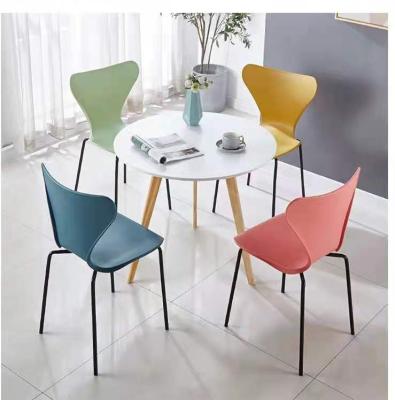 China Durable high quality new metal legs design plastic dining side chair fishtail shaped chair Stackable dining plastic chair for sale