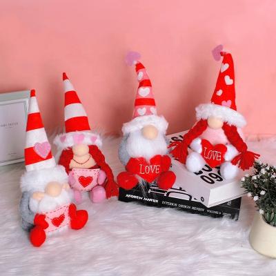 China Cute Letter Rudolph Faceless Doll Valentine's Day Gift Soft Wholesale Heart Wrap Doll Hug Peach for sale