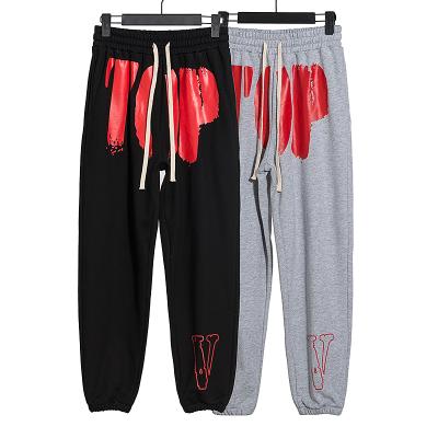 China custom Anti-wrinkle fashion vlones100% cotton printing men's and women's sports casual pants winter series loose wholesale for sale