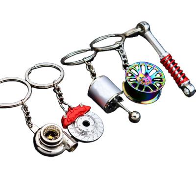 China Sublimation Modern Luxury Custom Car Metal Key Chain Turbo Gear Hub Disc Brake Creative Gift Main Shock Absorber Chain Pendant for sale