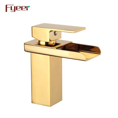 China Gold Metered Faucets Fyeer Water Faucet New Waterfall Deck Mounted Brass Basin Faucet for sale