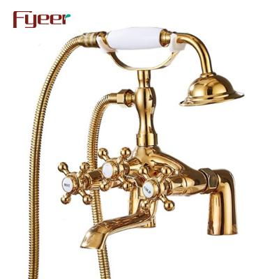 China Handleless Fyeer Betrayal Slide Bar Deck Mounted Gold Bathtub Faucet for sale