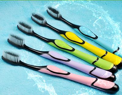 China Manual Toothbrush Soft Bristle Anti-Slip Design Diamond Shape Handle Adult Toothbrush for sale