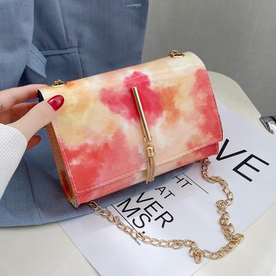 China 2023 New Arrival Motion Sensing Women Fashion Small Square Bag Chains Shoulder Bag Tassel Colorful PU Leather Cross - Body Bag For Ladies for sale