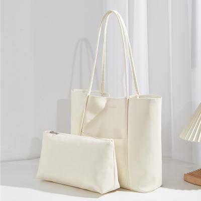 China 2023 Hot Sale Motion Sensing Vegan Leather Handbag Set Purse And Handbags Tote Bags For Ladies Hot Shoulder Bags for sale