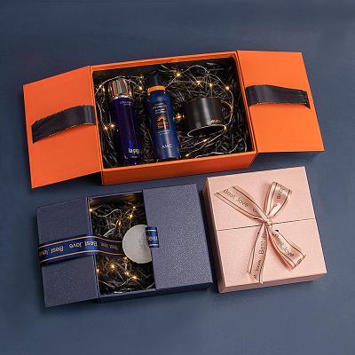 China Recycled Materials Spot Double Open Bow Gift Box Wedding Gift Box Scarf Vacuum Cup Christmas Blue Cosmetics Packaging Box for sale