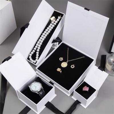 China Reused Pendant Gift Jewelry Boxes Bow Storage Kraft Paper Boxes Clamshell Materials Ribbon Box Watch Necklace Earrings Bracelet Ring White for sale