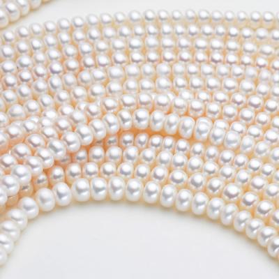 China Hot Selling A Grade Freshwater Button Shape Pearl White Color River Pearls String Natural Pearl Freshwater Pearls For Necklace for sale