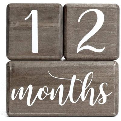 China Wooden Milestone Calendar Baby Family Table Calendar Pine Block Age Memorial Block Custom Wooden Block Material for sale