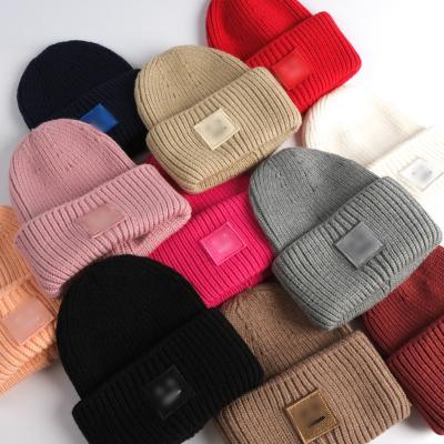 China Custom Wholesale JOINT Logo Color Knit Cuff Fold Over Cotton Beanie Hat Blank Acrylic Plain Beanie Knitted Hats Beanies for sale