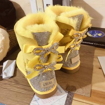 China Wholesale 2022 Fashion Trend Women Kids Sheepskin Ladies Winter Snow Ribbon Fur Boots With Bows for sale