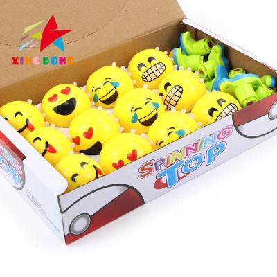 China Top Promotional Cheap Smiling Spinning Face Flashing Top Toy Kids Spinning Top Toy With Music And Light for sale