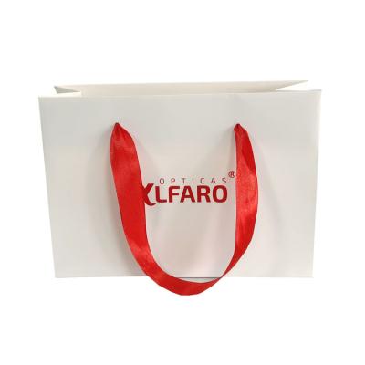 China Recyclable Custom Logo Printing Shipping Gift White Fancy Paper Bag for sale