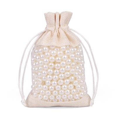 China Jewelry Fashion Designs Organza Small Jute Burlap Pouch Cosmetic Canvas Drawstring Bag for sale