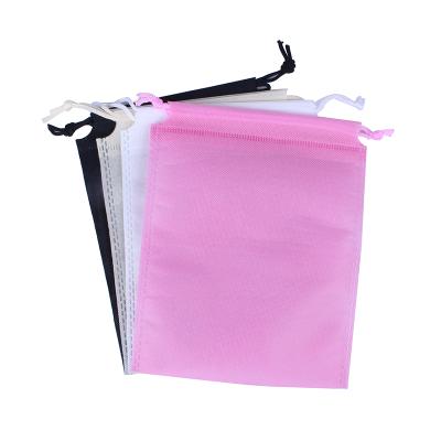 China Hot Selling Fashion Shopify 45*55CM Ice Pack Nonwoven Drawstring Bags Pink Black Beige for sale