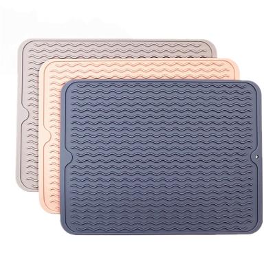 China Sustainable Use Tripod Multi Dish Silicone Dry Mat For Kitchen Counter for sale