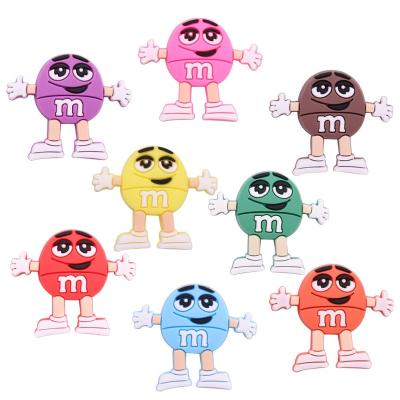 China Wholesale Soft Customize PVC Shoe Charm Millimeter Chocolate Beans Designer Shoe Decorations Fang Charms for sale