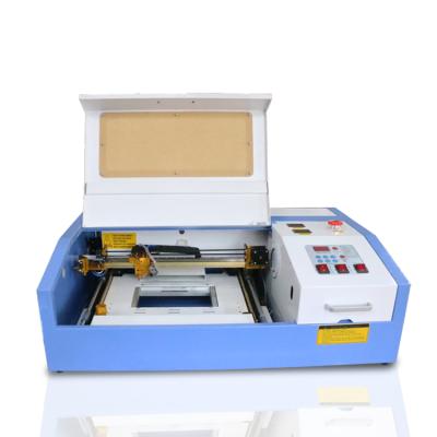 China Laser Engraving Mini Laser Rubber Stamp Machine 3020 CO2 Laser Machine High Precision for sale