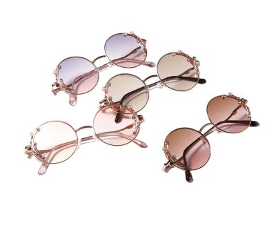 China Fashion Sunglasses High Quality Round Rhinestone Decorate Frame Gradient AC Lens Women Copper Sunglasses for sale