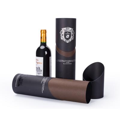 China Handmade special shape curve cutting oval wine bottle paper box packing paper packaging tube for whiskey champagne vodka for sale