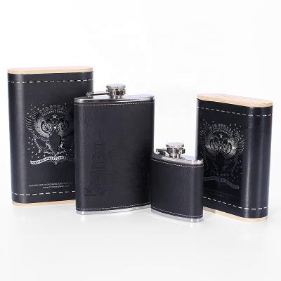 China Unique Fancy Handmade PU Paper Luxury Leather Bamboo Tube Packaging Slim Oval Shape Wine Whiskey Box for sale