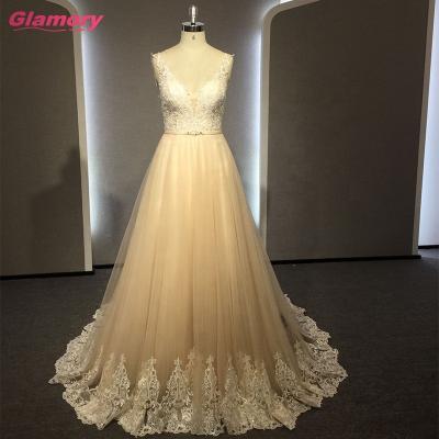 China Newest Designer Light Champagne Bride Gowns Gorgeous Lace Breathable Sleeveless Long Wedding Dress for sale