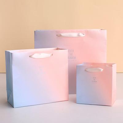 China China Recyclable Wide Gift Paper Bag Base Kraft Paper Shopping Bags With Your Own Logo for sale