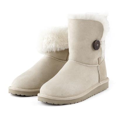 China Botas de nieve de piel de oveja unisex con forro para invierno en venta