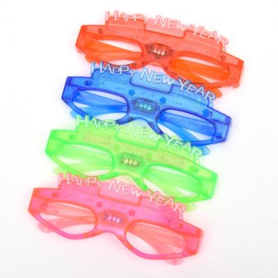 China New 2022 Modern Led Glasses Happy New Year Plastic Flashing Light Lead Glasses For Party Decoration for sale